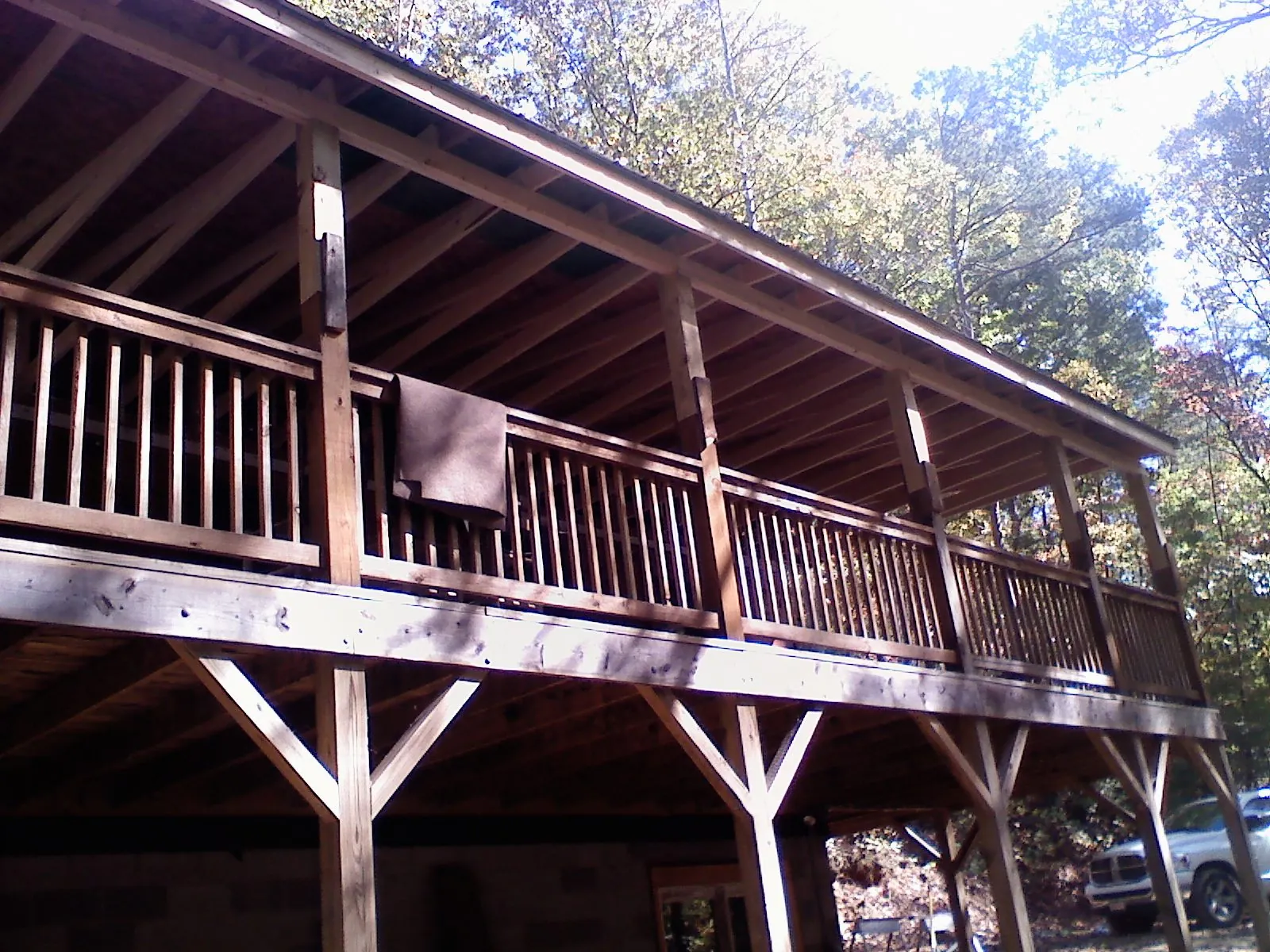 Timber framing under a new elevated porch and deck — Roof Leak Repair in Oriskany Falls by Roofing Brothers